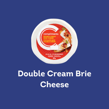 A block of Compliments Double Cream Brie Cheese